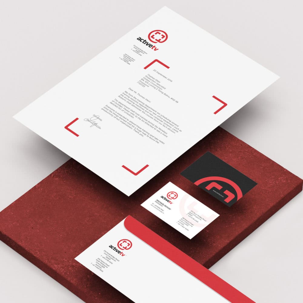 Brand identity design for activetv showcasing letterhead, business card, and envelope with red and black elements.