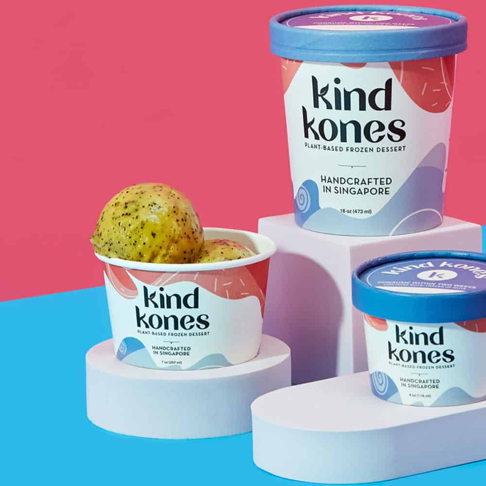 Kind Kones packaging design; colorful brand identity for plant-based dessert, featuring tubs and scoops on vibrant background.