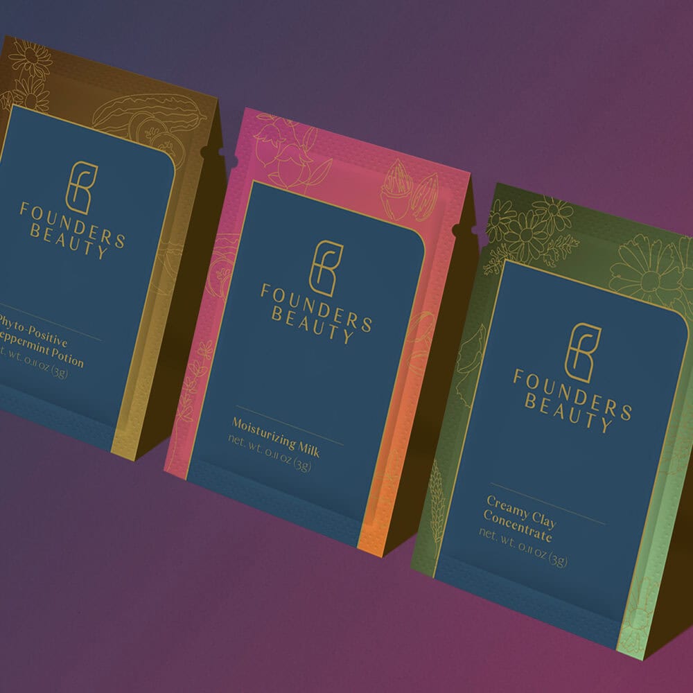 Founders Beauty branding showcases colorful packaging with elegant floral designs for peppermint, milk, and clay products.
