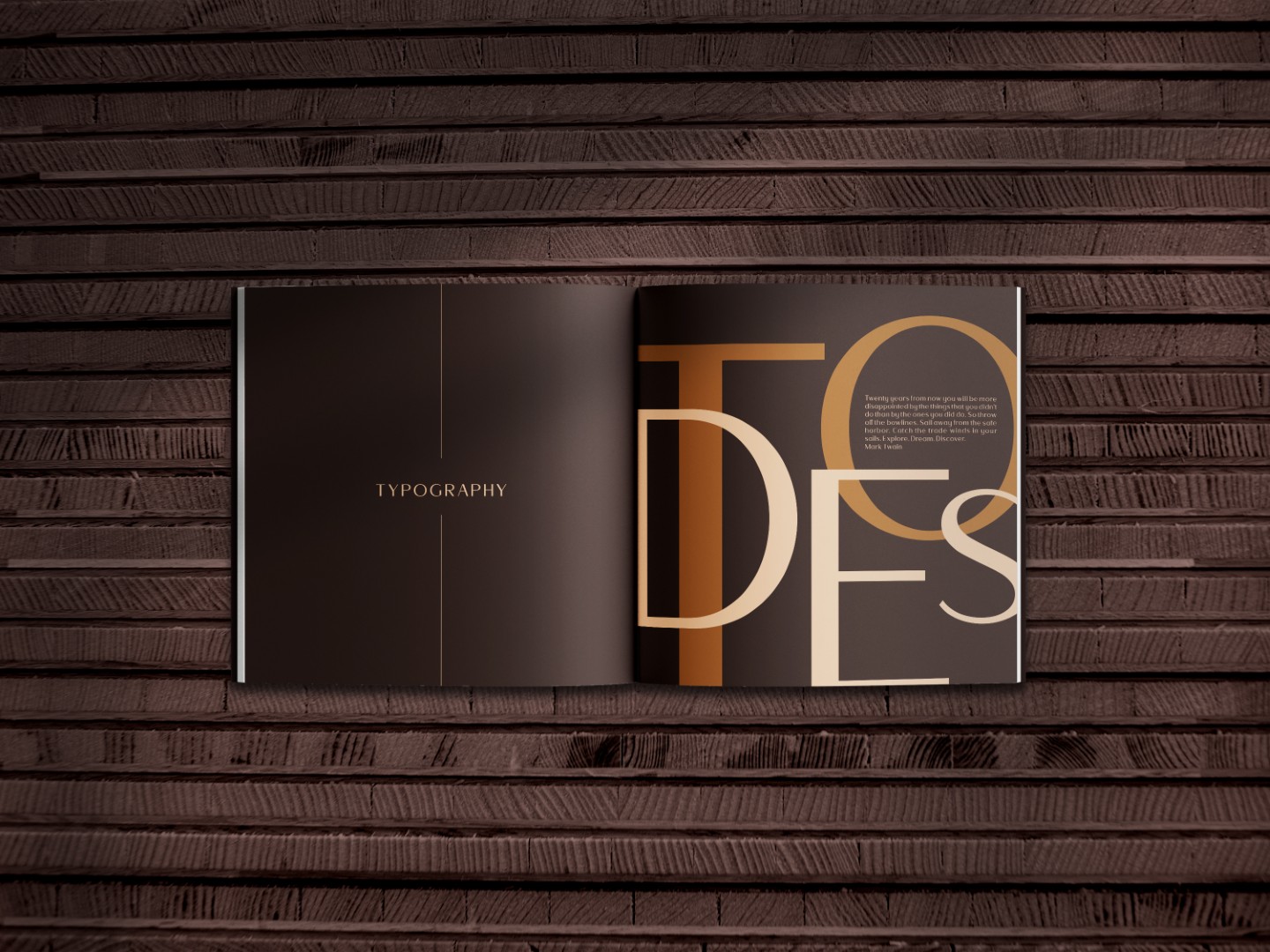 Open book on typography design with bold, modern lettering, showcasing brand identity and visual identity concepts.